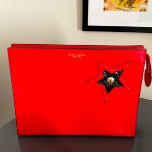 Henri Bendel West 57th Travel Cosmetics Clutch. Red with black sequin star. NWOT